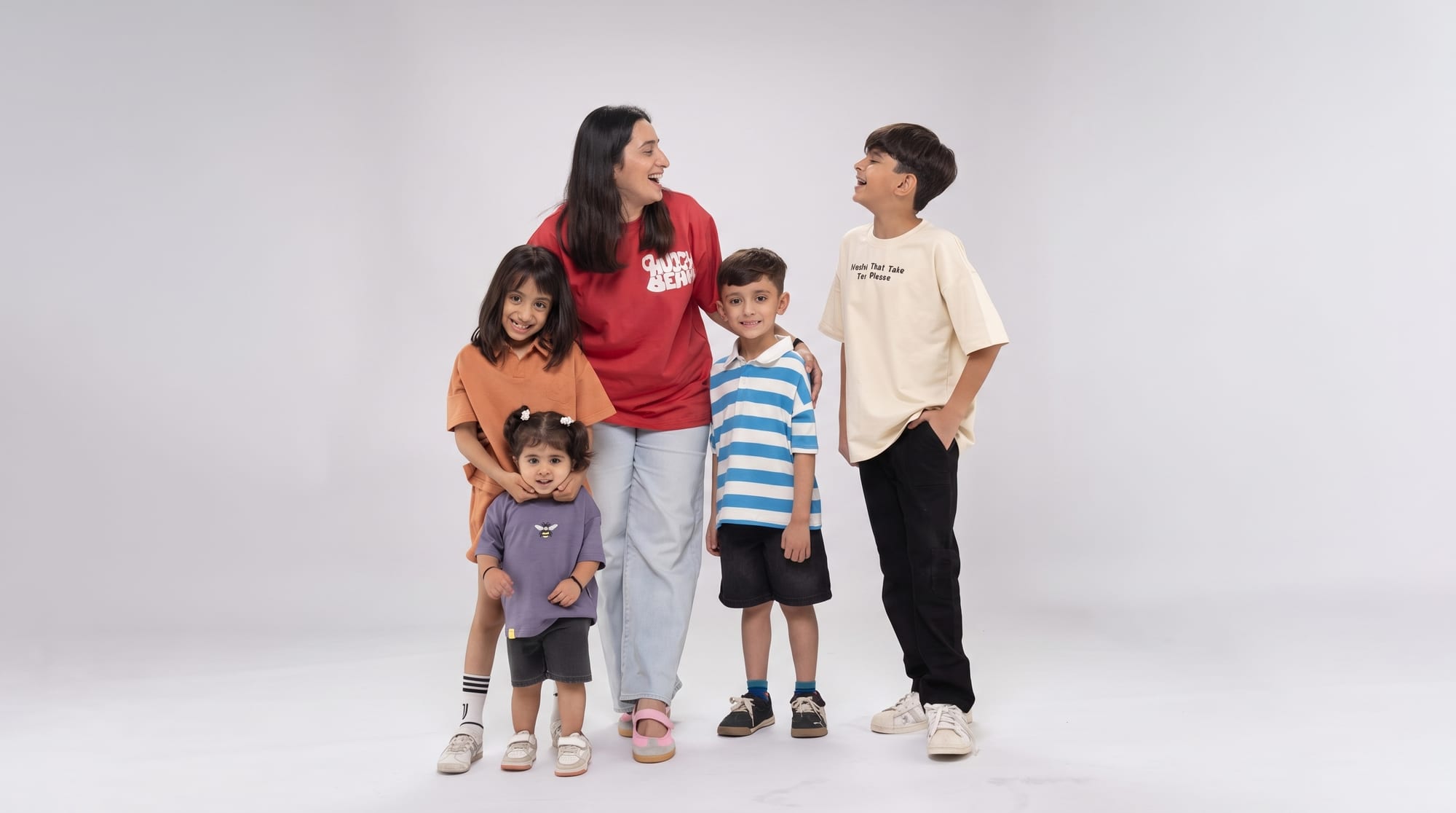 SKWEE founder with kids in SKWEE tees